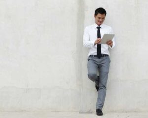 Asian-Businessman-using-tablet_0