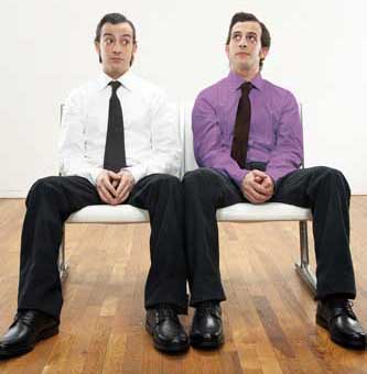 Twins-businessmen-on-chairs-1