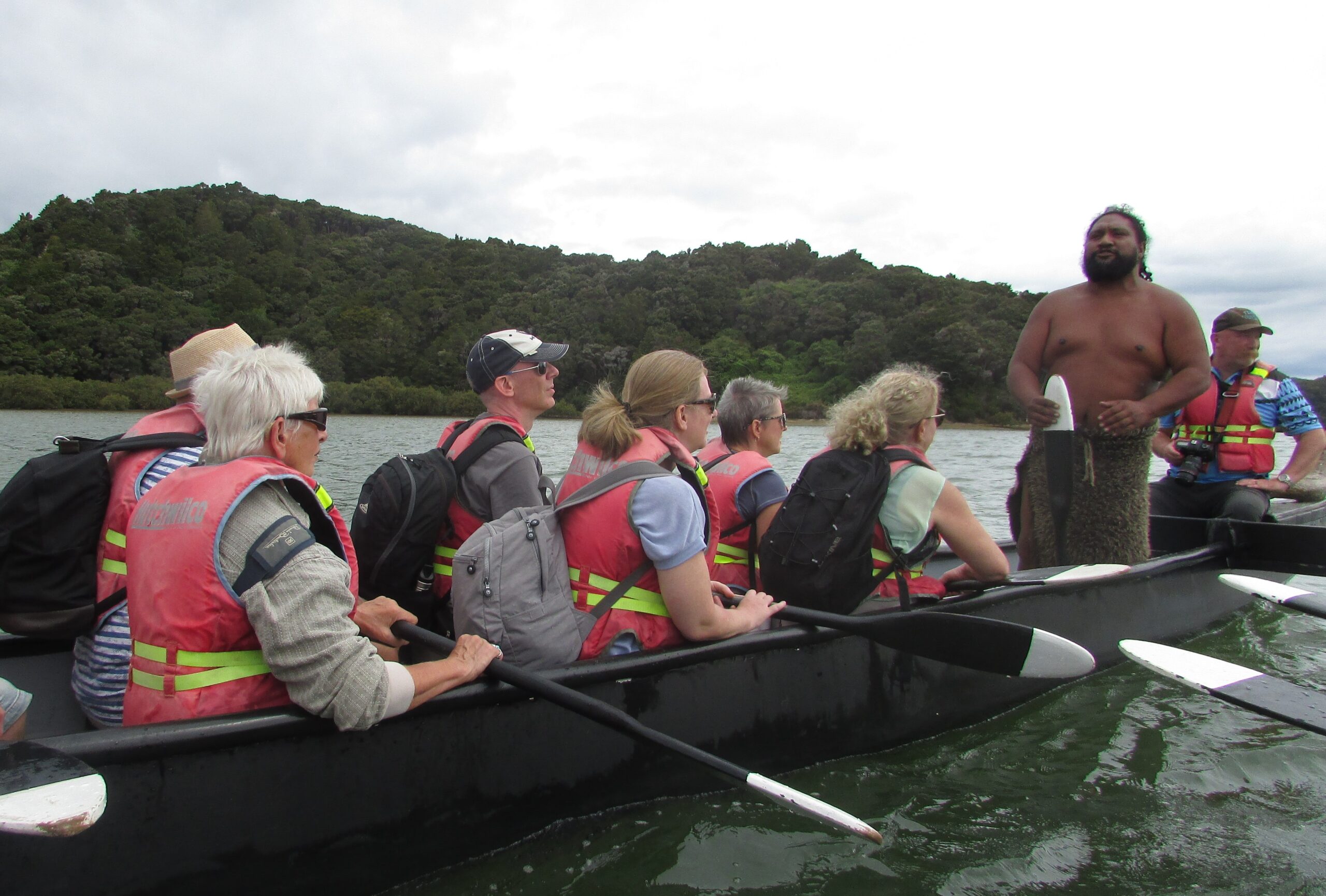 A pause in paddling while waka master Rob tells a story (2)