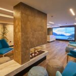 2-mi-pad-queenstown-lobby-featuring-fall-to-ceiling-social-wall