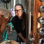 Island Gin owner and distiller, Andi Ross with here bespoke copper still