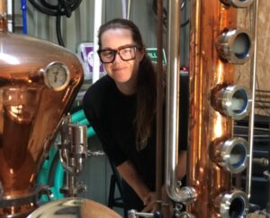 Island Gin owner and distiller, Andi Ross with here bespoke copper still